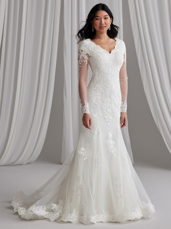 Bride wearing Kimberly modest wedding dress by Maggie Sottero