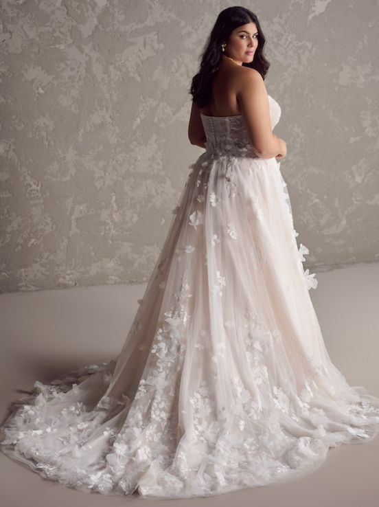 Bride wearing Laila lace wedding dress by Maggie Sottero