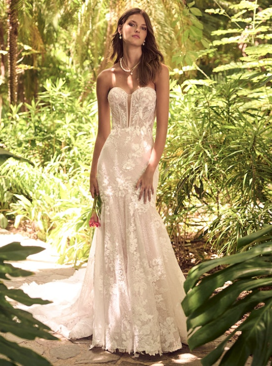 Bride wearing Ortensia lace wedding dress by Maggie Sottero