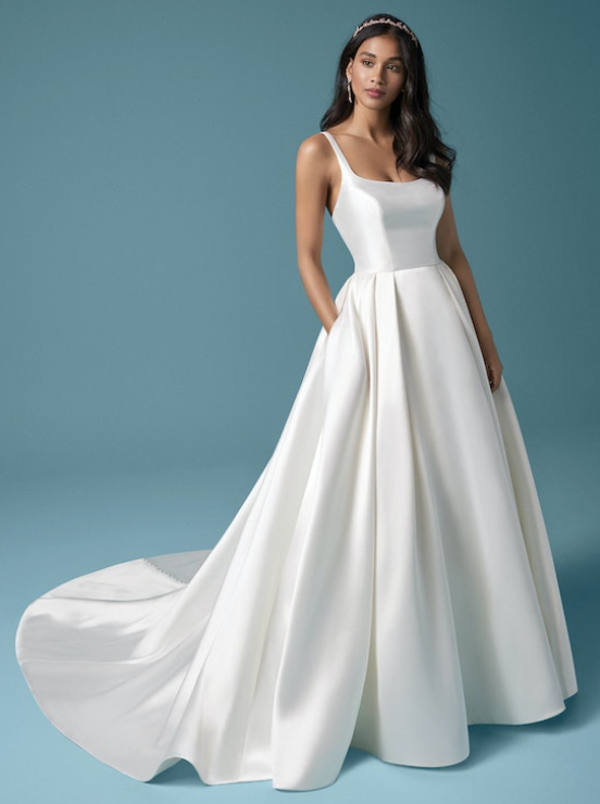 Bride wearing Selena wedding dress by Maggie Sottero