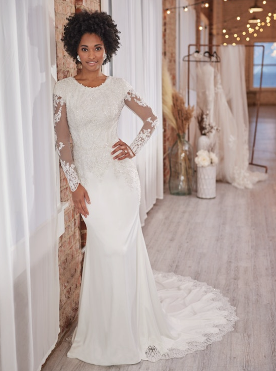 Bride wearing Yates Leigh modest wedding dress by Maggie Sottero