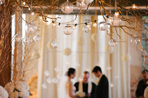 Hanging light fixtures at a wedding venue