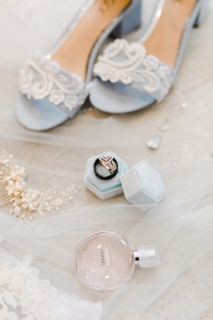 Blue shoes and ring box as a something blue wedding tradition