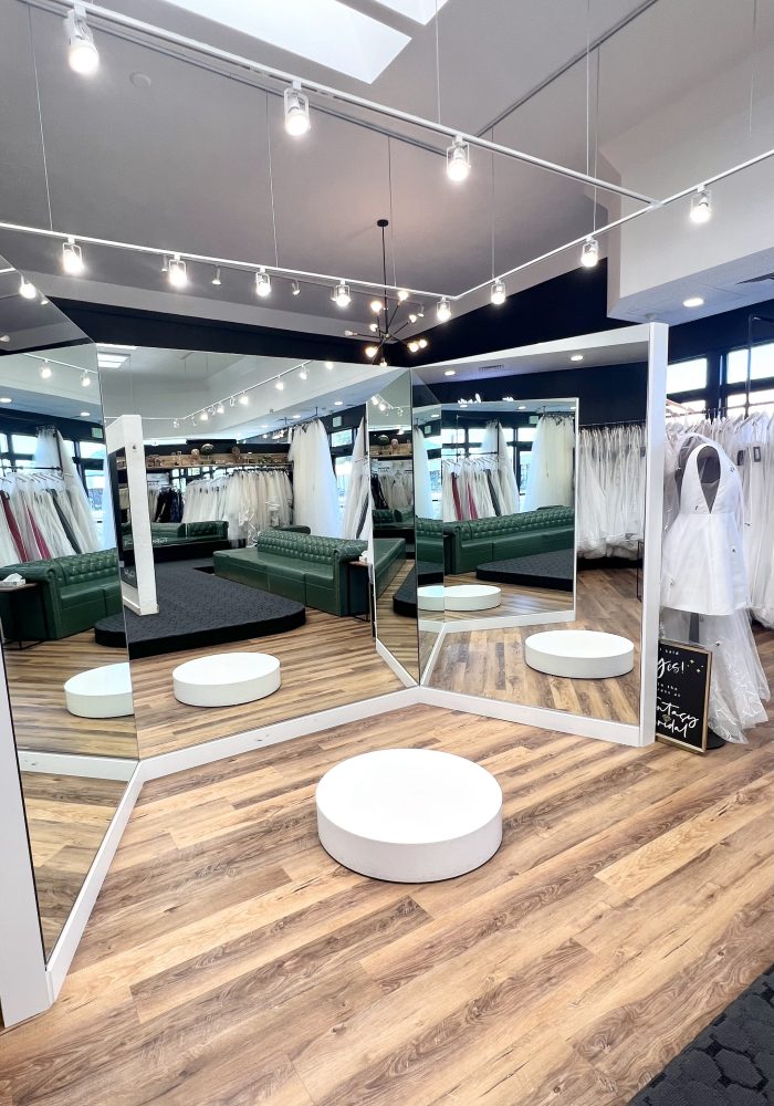 Inside of a boutique where brides will have a wedding dress alterations appointment