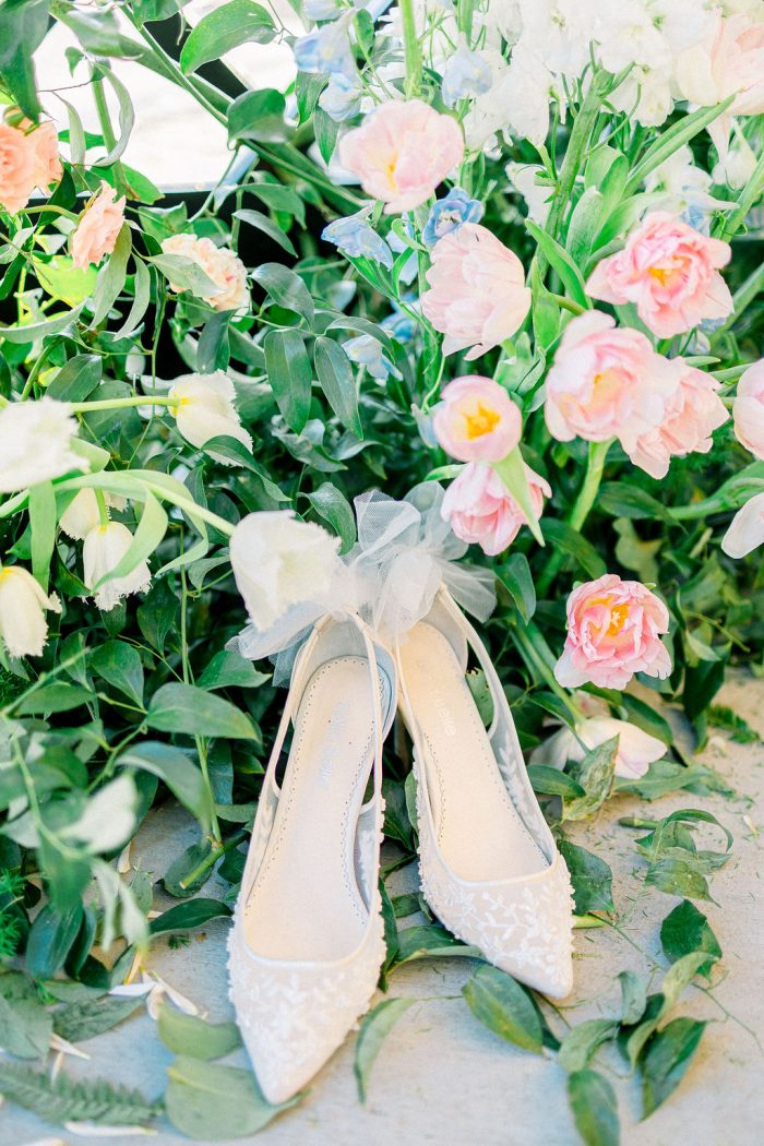 Shoes and flowers in spring wedding colors