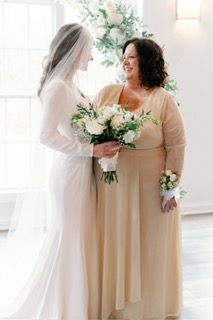 Riley wearing Fernanda by Maggie Sottero with the mother of the bride
