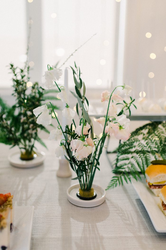 Table settings with food in spring wedding colors