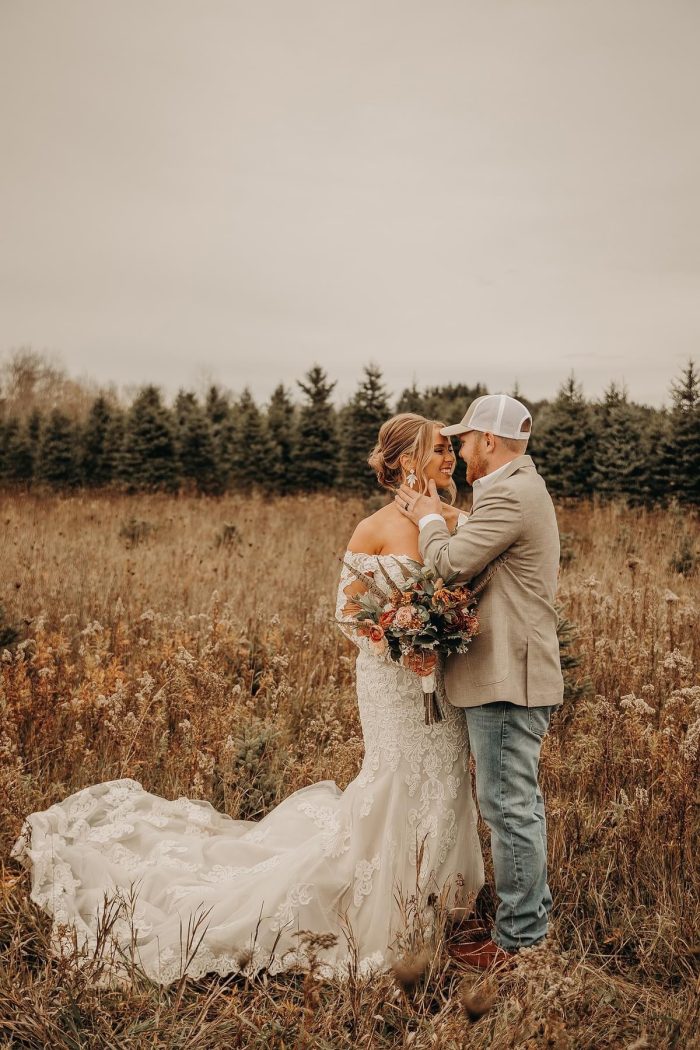 Bride wearing western wedding dress Fiona by Maggie Sottero with her husband