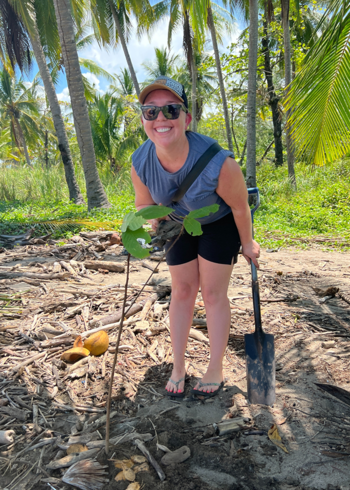 Maggie Sottero employee planting a tree through One Tree Planted partnership working towards reforestation efforts in Costa Rica