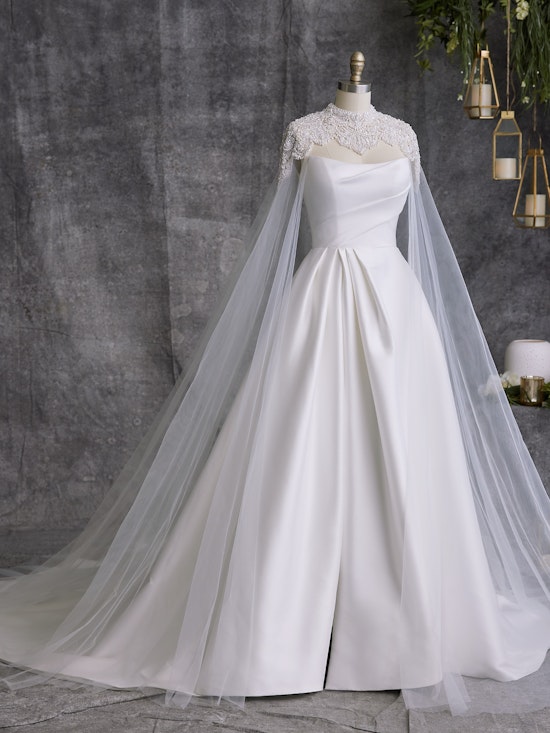 Bride wearing Clark Detachable Cape as a wedding dress customization