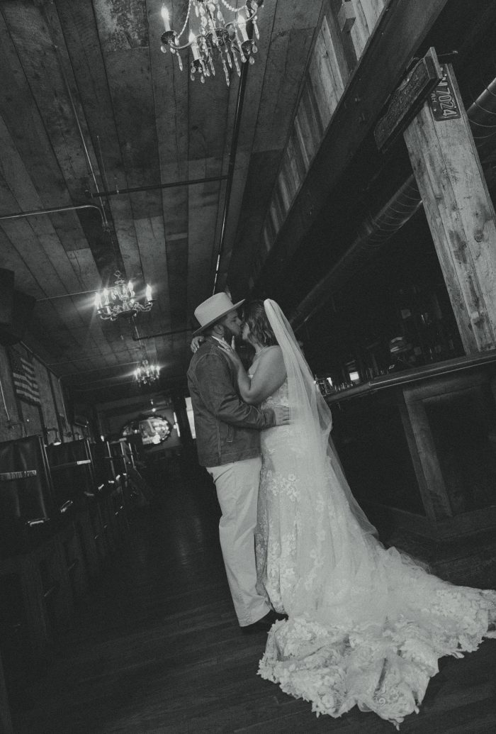 Bride wearing a bridal gown by Maggie Sottero in a Western styled shoot