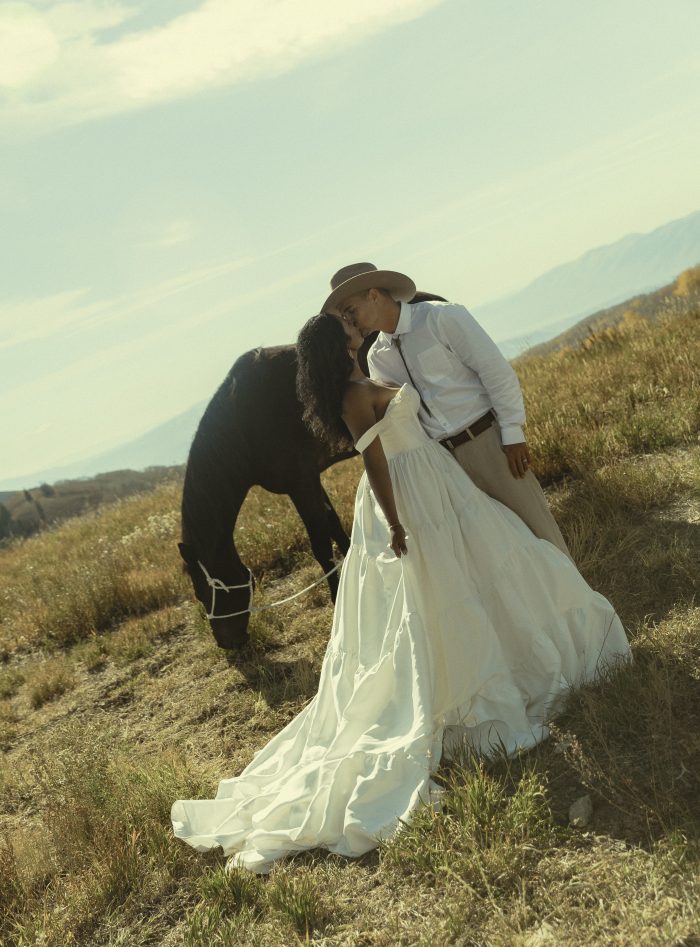 Bride wearing a bridal gown by Maggie Sottero in a Western styled shoot