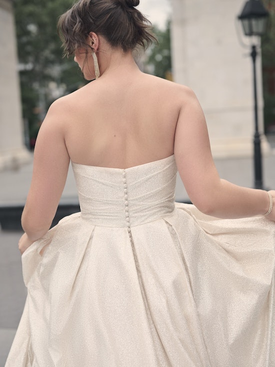 Bride wearing one of our winter wedding dresses called Anniston by Maggie Sottero