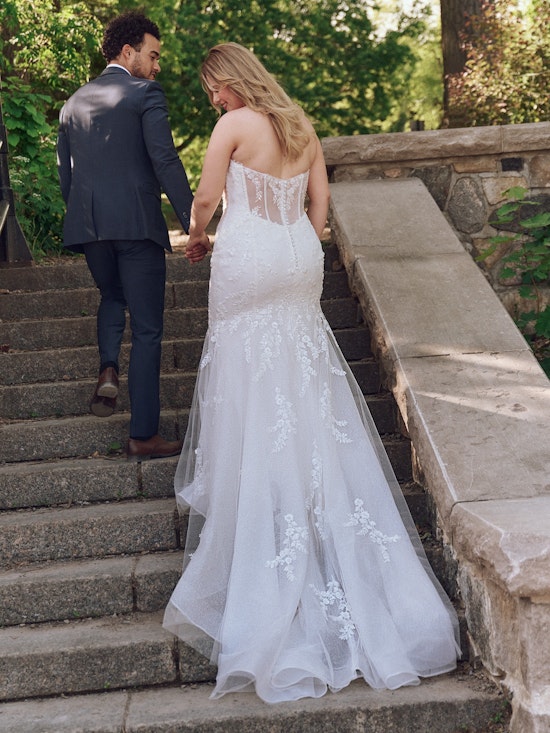 Bride wearing one of our winter wedding dresses called Benjie by Maggie Sottero