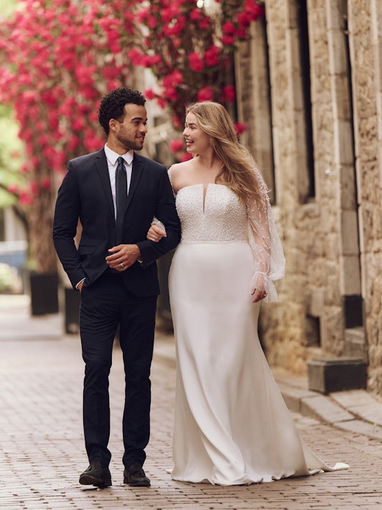 Bride wearing one of our long sleeve wedding dresses called Heyda by Rebecca Ingram