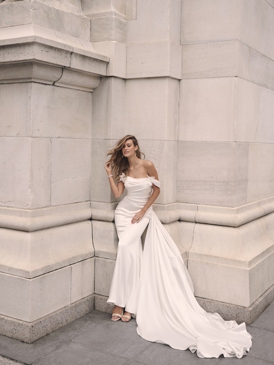 Bride wearing a Cameron wedding dress train by Maggie Sottero