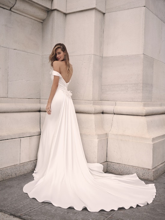 Bride wearing a Cameron wedding dress train by Maggie Sottero