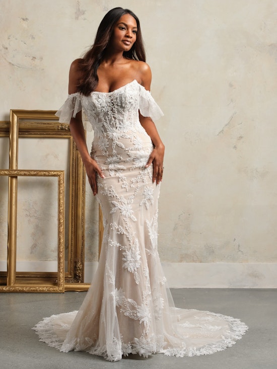 Bride wearing Madrona off-the-shoulder wedding dress by Maggie Sottero