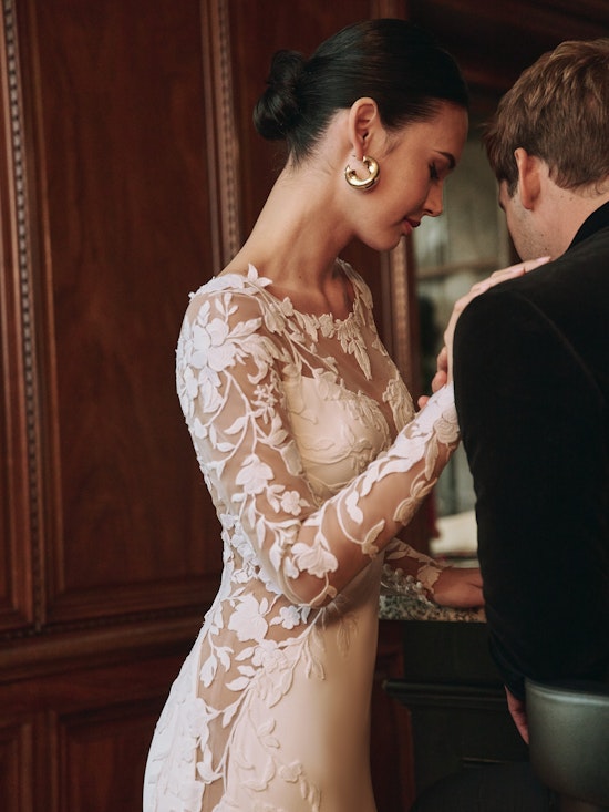 Bride wearing Miami long sleeve wedding dress by Sottero and Midgley