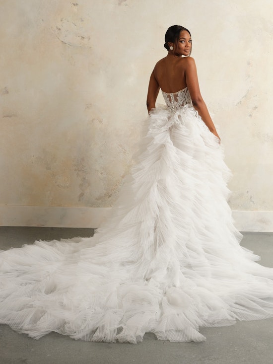 Bride wearing a Nyjah wedding dress train by Maggie Sottero