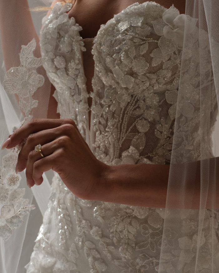 Bride wearing Twilight by Sottero and Midgley, featuring intricate textures wedding dress trends