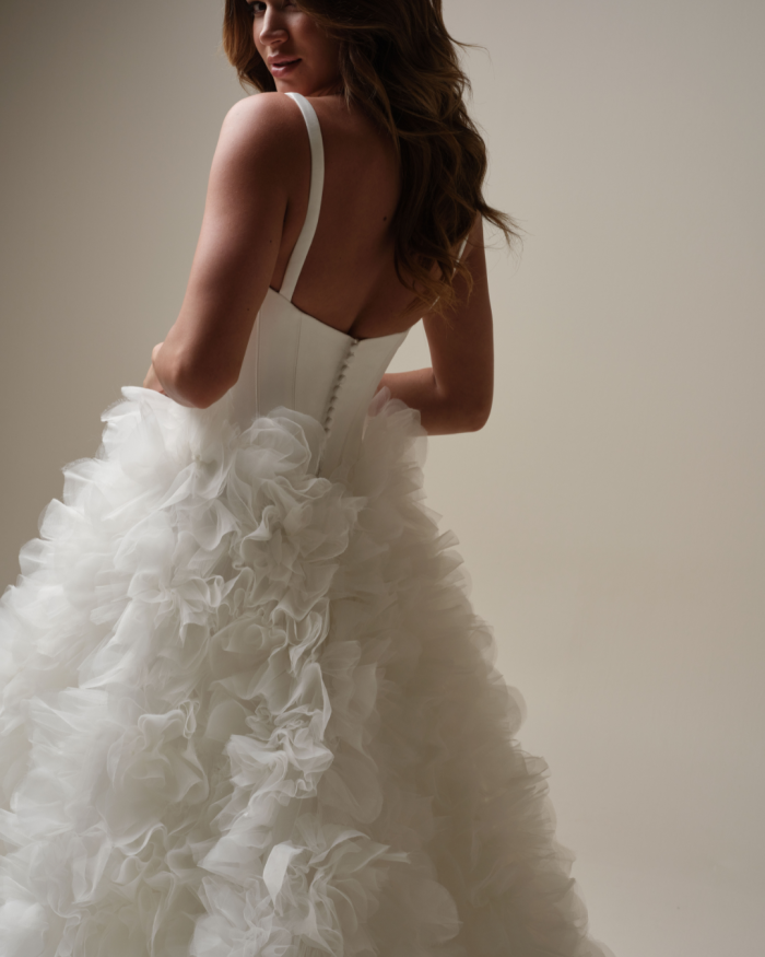 Bride wearing Ross by Sottero and Midgley, featuring standout skirt wedding dress trends