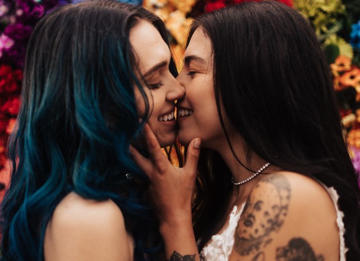 Brides kissing for LGBTQ+ wedding ideas