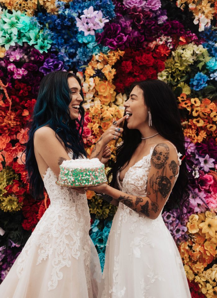 Colorful sprinkle cake for LGBTQ+ wedding ideas with bride wearing Harlem by Maggie Sottero