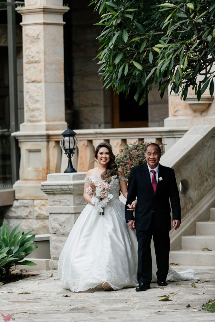 Bride wearing Kimora by Sottero and Midgley with her father figure