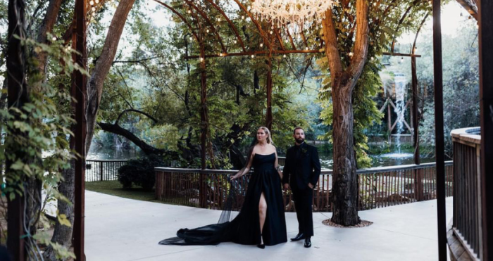 Bride wearing black wedding dress Aspen by Maggie Sottero with her husband
