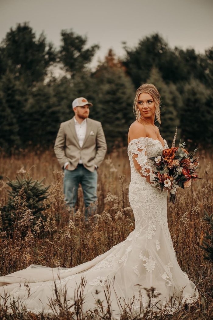 Bride wearing Fiona western wedding dress by Maggie Sottero with her husband