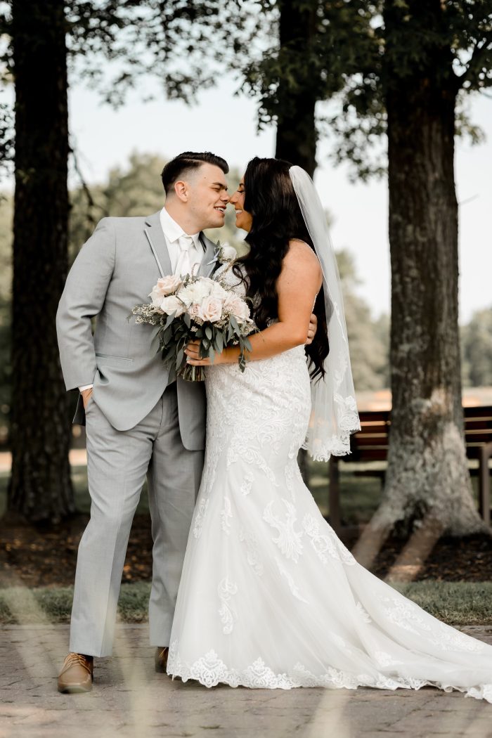 Bride wearing Fiona mermaid wedding dress by Maggie Sottero