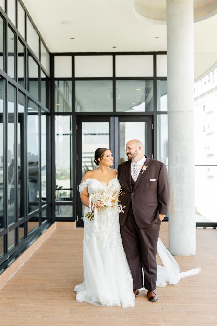 Bride wearing Frederique mermaid wedding dress by Maggie Sottero