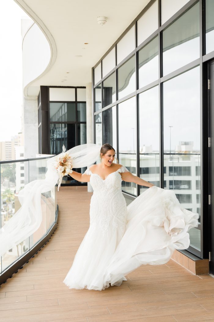 Bride wearing Frederique mermaid wedding dress by Maggie Sottero