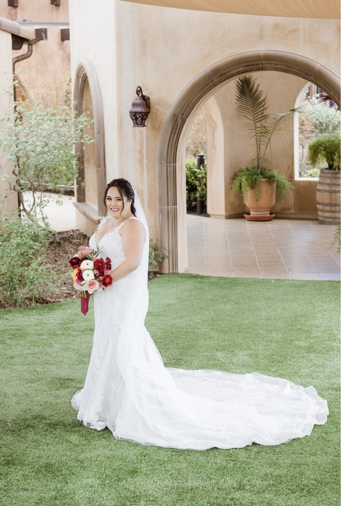 Bride wearing Frederique mermaid wedding dress by Maggie Sottero