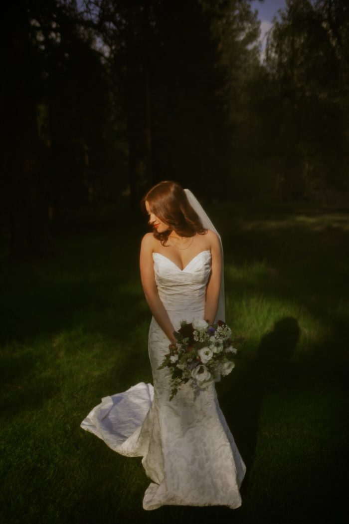 Bride wearing Hilo mermaid wedding dress by Maggie Sottero