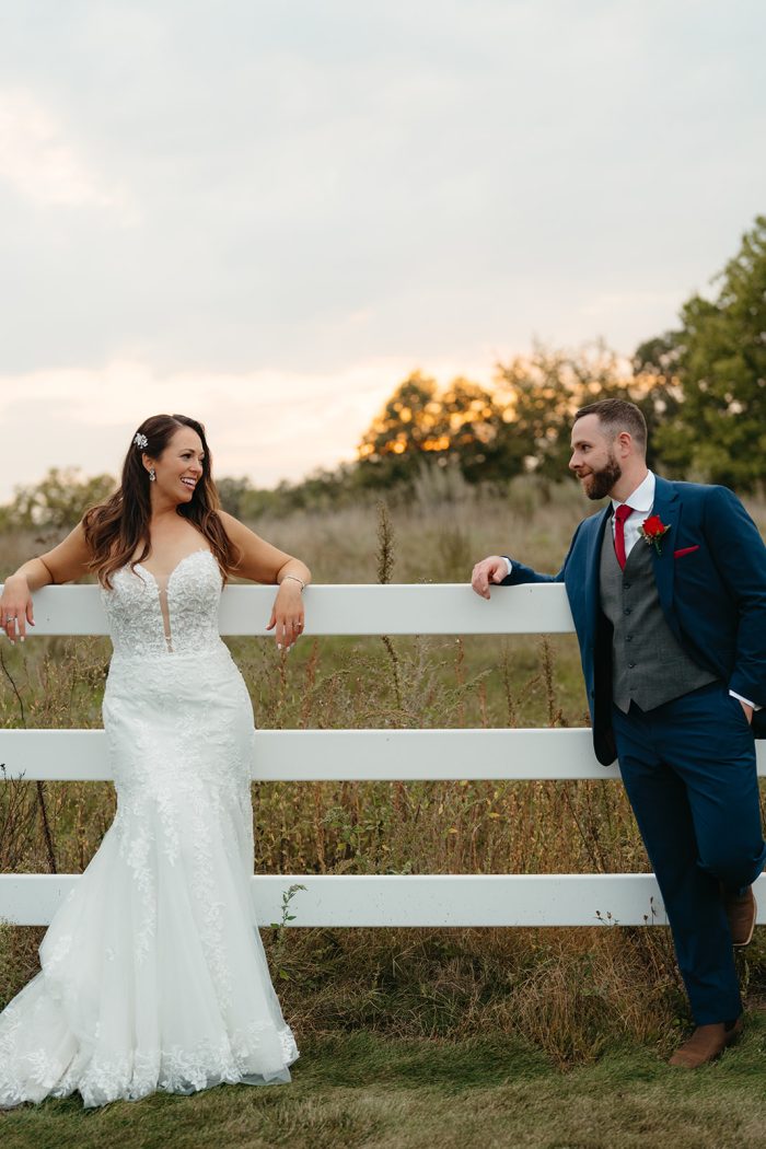 Bride wearing Lennon western wedding dress by Maggie Sottero with her husband