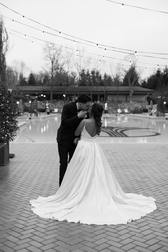 Bride wearing Scarlet backless wedding dress by Maggie Sottero