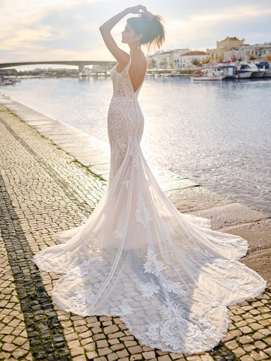 Bride wearing backless wedding dress Franklynn by Sottero and Midgley