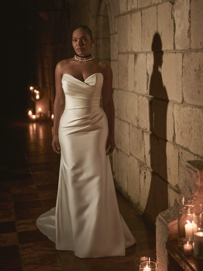 Bride wearing a satin sheath wedding dress with a sweetheart neckline
