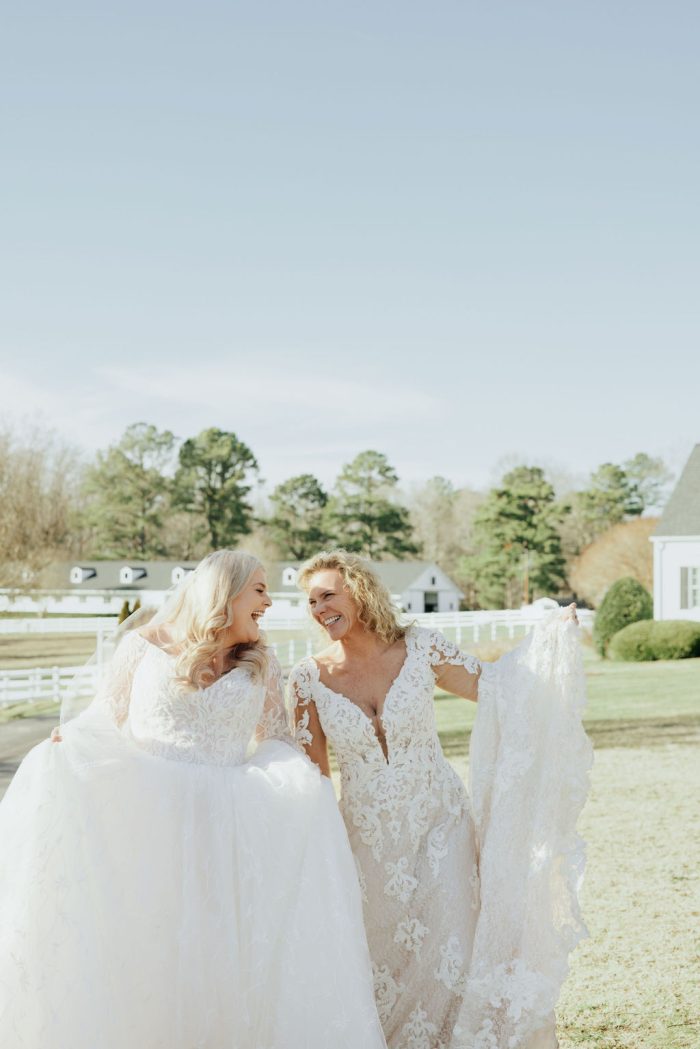 Brittany wearing one of Maggie Sottero's maternity wedding dresses and her mom in her own Maggie Sottero wedding dress