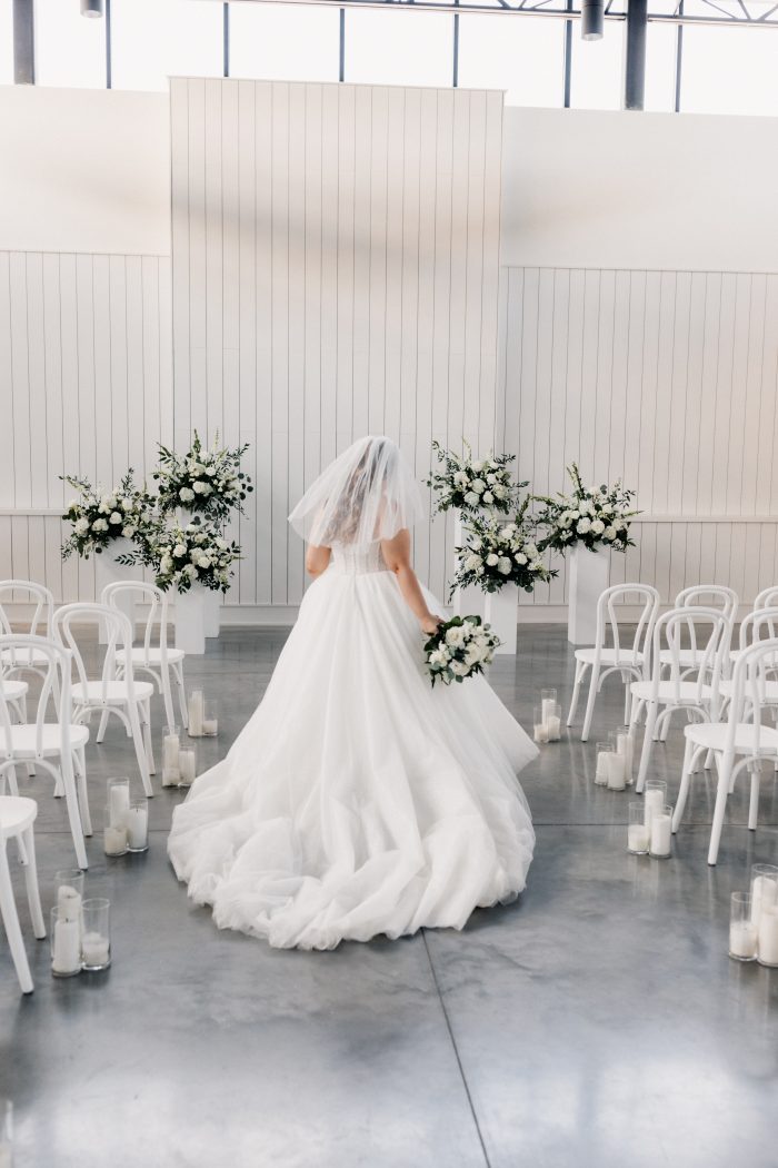 Bride wearing Elton by Sottero and Midgley as part of her bridal style