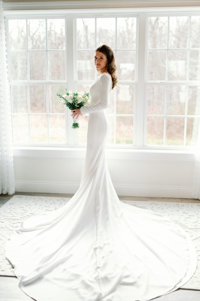 Bride wearing Fernanda by Maggie Sottero as part of her bridal style