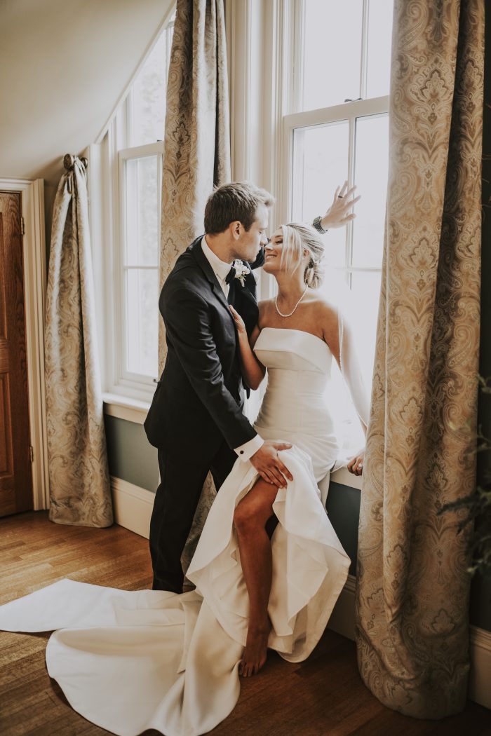 Bride wearing Mitchell by Maggie Sottero as part of her bridal style