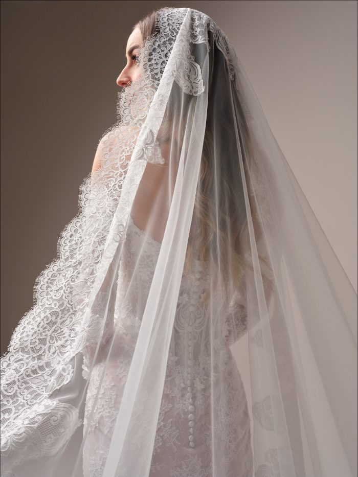 Bride wearing a lace bridal veil