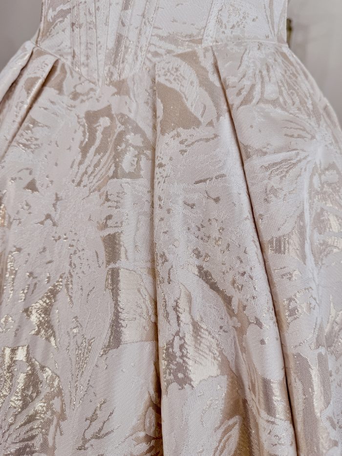 Up-close look at fabric of designer wedding dress Derrick Marie by Maggie Sottero