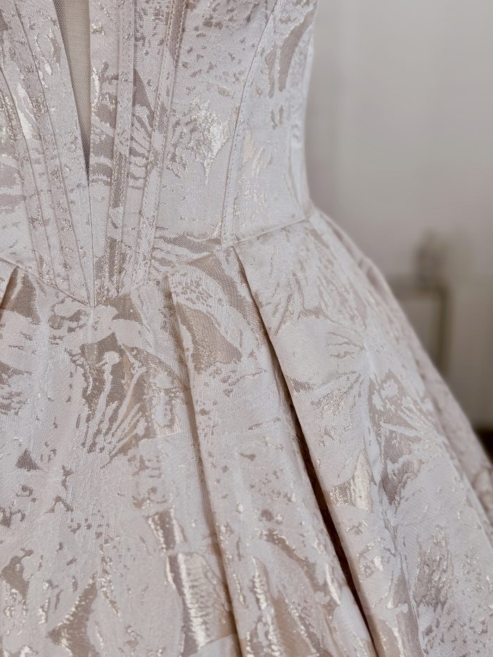 Up-close look at fabric of designer wedding dress Derrick Marie by Maggie Sottero