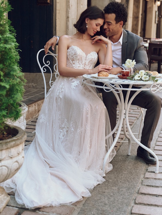 Bride wearing a wedding dress made with lower-impact fabrics called Jalissa by Rebecca Ingram