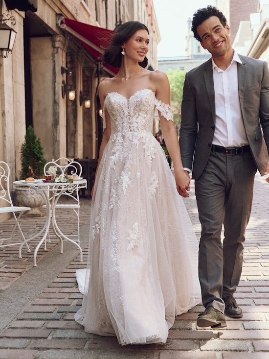 Bride wearing a wedding dress made with lower-impact fabrics called Jalissa by Rebecca Ingram