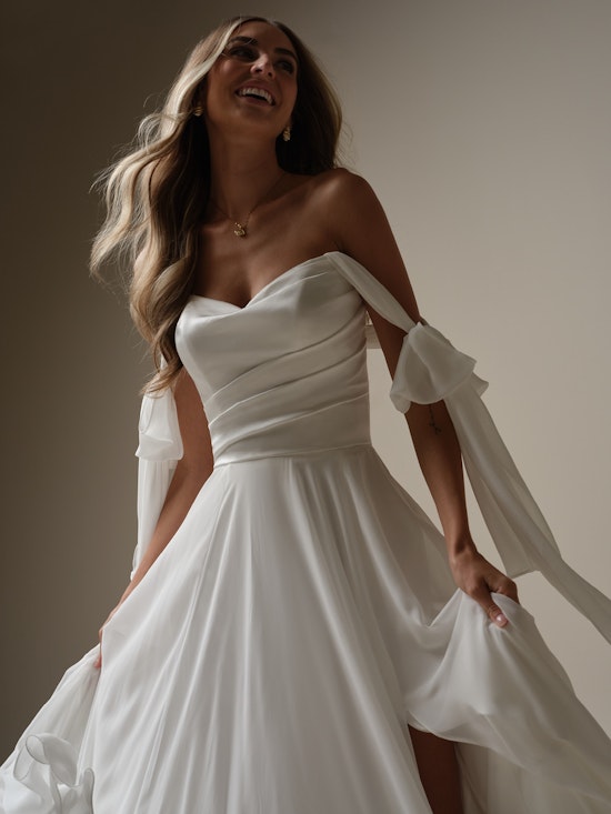 Bride wearing Melody by Rebecca Ingram